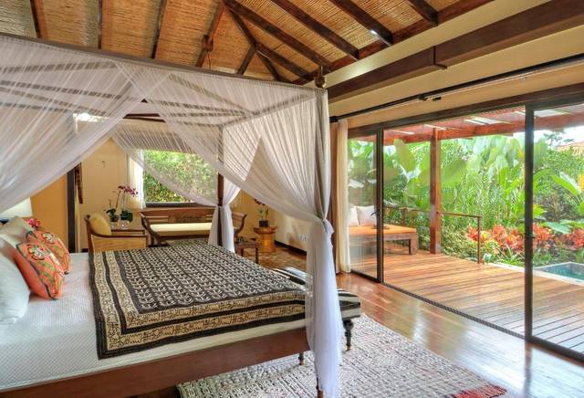 Suite opening to a private deck and garden